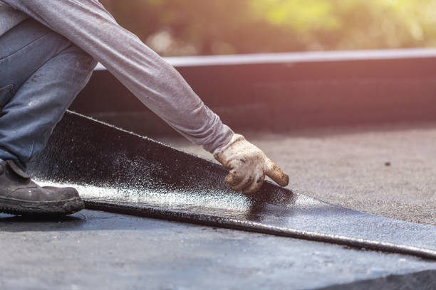 Professional Waterproofing technician working in East Islip, NY